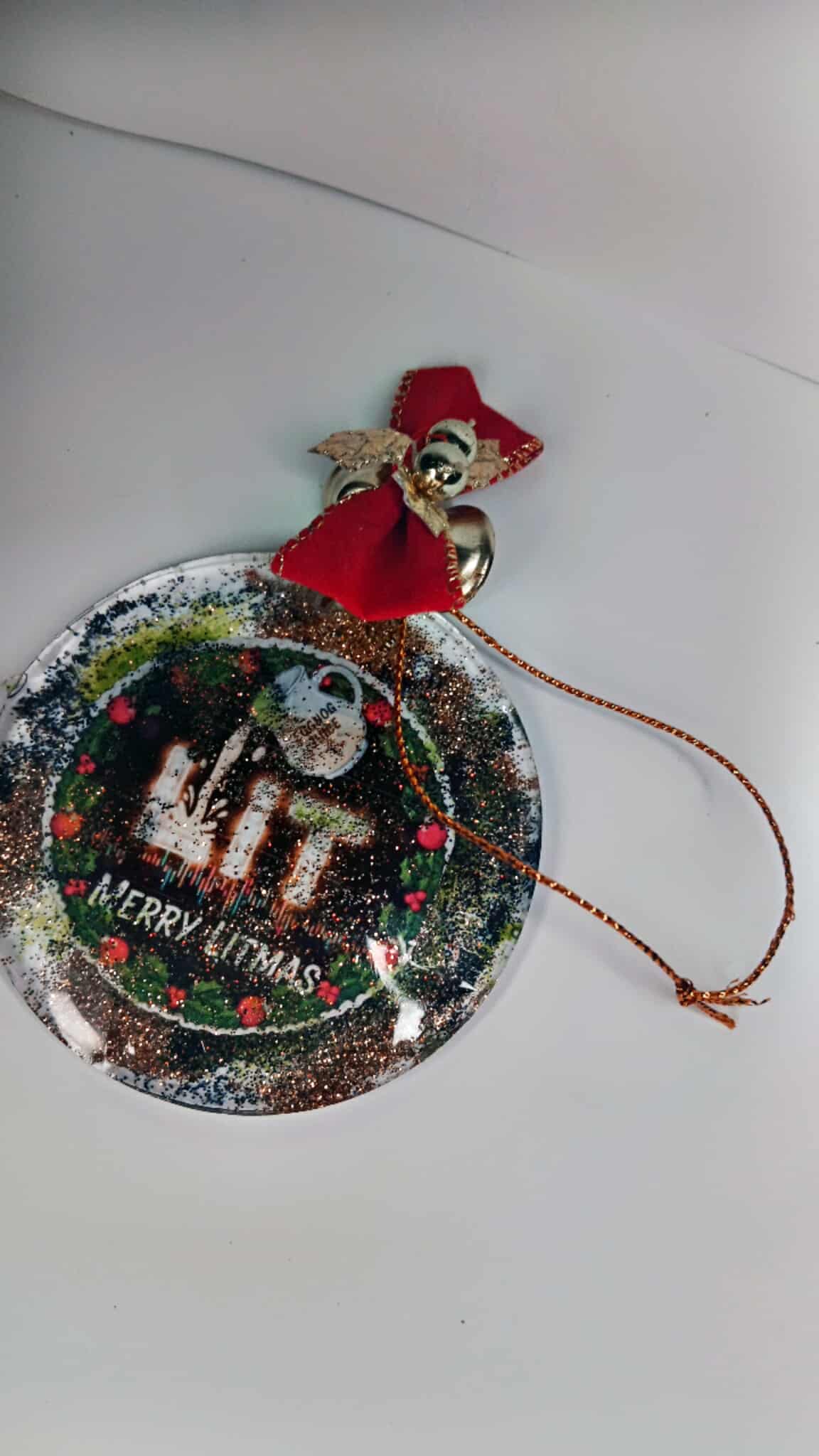 Decorative Christmas ornament with a reindeer design on a white background