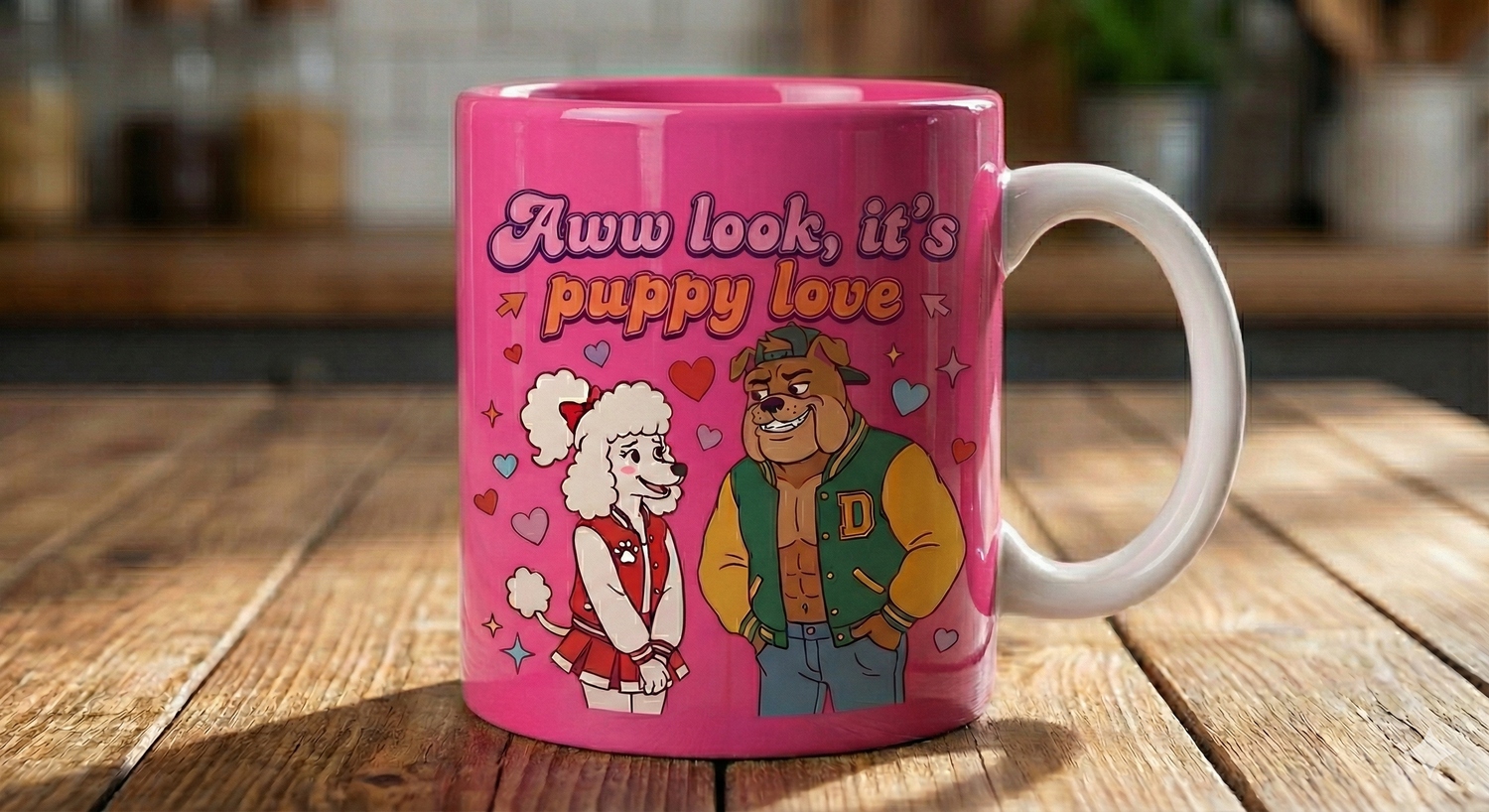 Pink mug with cartoon characters and 'Aww look, it's puppy love' text on a wooden surface.