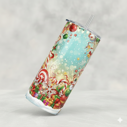 Tumbler with festive design featuring candy canes, presents, and snowflakes on a light blue background.